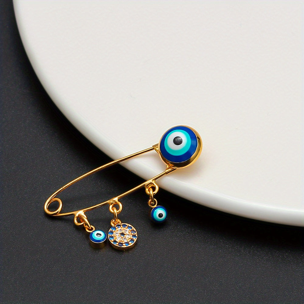 Broche Mano de Hamsa con Ojo Azul — Amuleto Dorado de Protección y Buena Fortuna Para Bebes