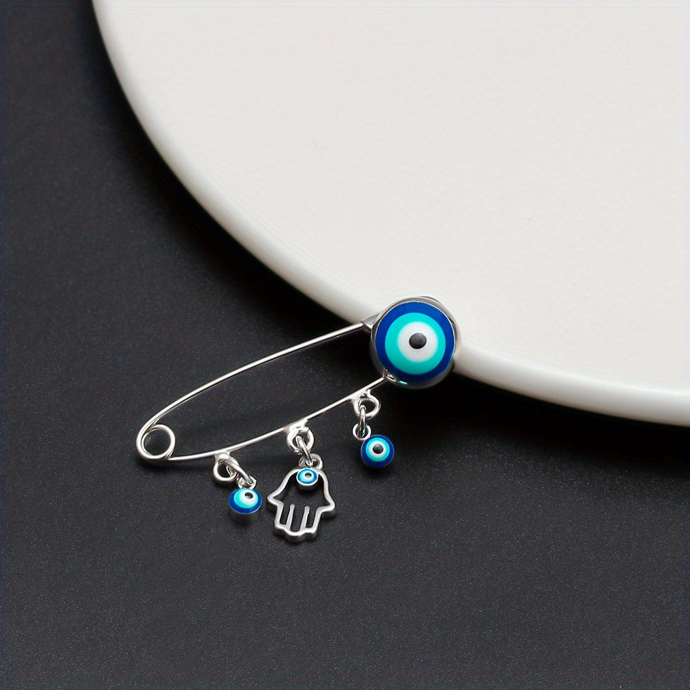 Broche Mano de Hamsa con Ojo Azul — Amuleto Dorado de Protección y Buena Fortuna Para Bebes