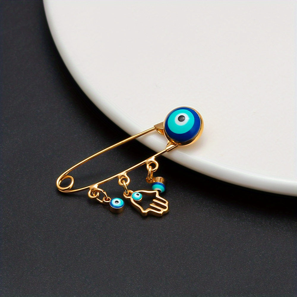 Broche Mano de Hamsa con Ojo Azul — Amuleto Dorado de Protección y Buena Fortuna Para Bebes